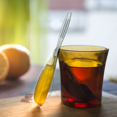 sealed single portion honey spoon