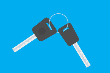 Two keys on the metal ring,isolated on blue background