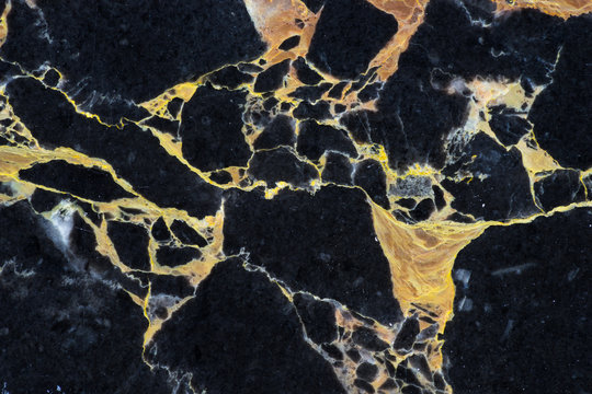 golden black marble with abstract pattern texture design