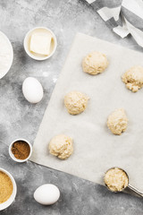 Ingredients for baking of cookies - flour, eggs, spices, vanilla, butter, sugar. Top view. Food background