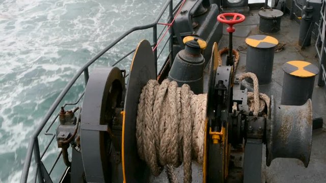 Large ferry boat with ropes on deck close-up