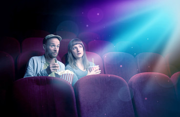 Naklejka premium Teenager couple watching movie