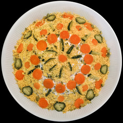 Garnished Olivier Salad Served In White Porcelain Bowl Isolated On Black Background