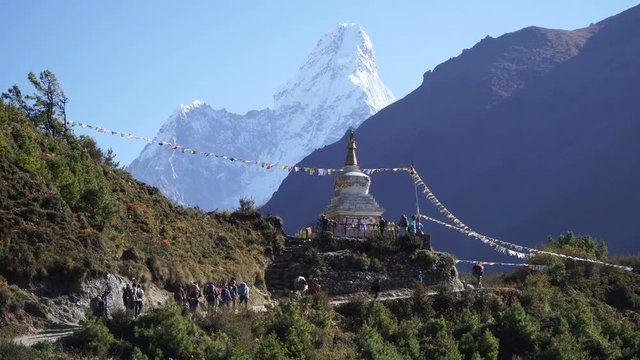 The Buddhist stupa on the hiking trail to the base camp of Everest. A lot of trackers follow the path.