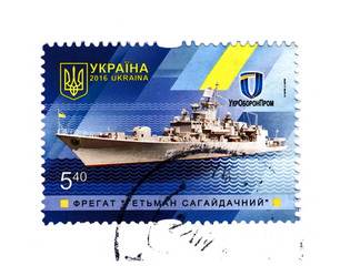 Ukrainian military frigate hetman Sagaydachny, Ukraine, circa 2016: postal stamp isolated on white background. marine ship