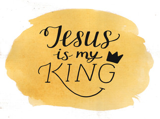 Hand lettering Jesus is my King on watercolor background.