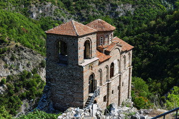Fototapeta na wymiar Church of the Holy Mother of God in Asen's Fortress and Rhodopes mountain