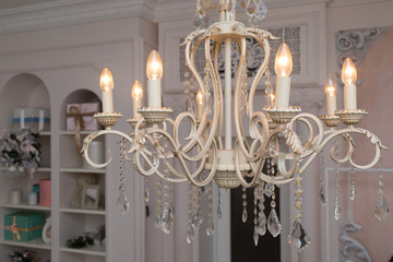 White chandelier in retro style