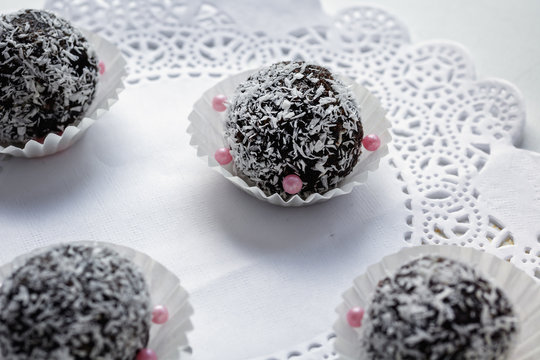 raw carob and coconut candies with dates and nuts , handmade. Vegan useful dessert