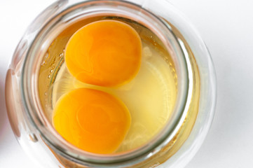 egg yolks in a glass bowl