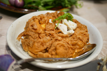 Crab omelet on top with coriander