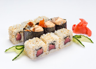 Sushi and roll set with seafood isolated on white background. Japanese cuisine.