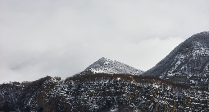 Winter mountain village landscape with snow