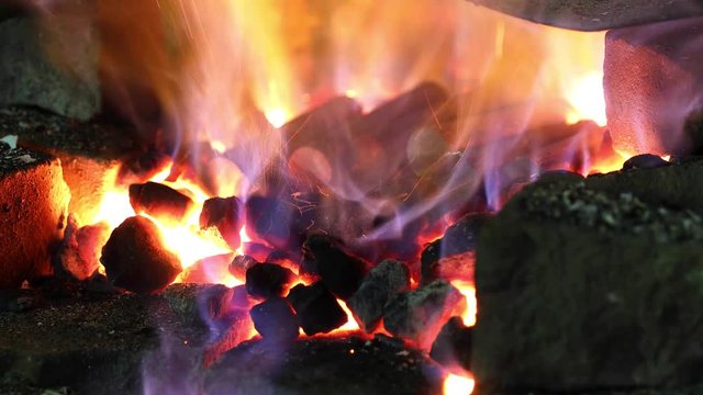 Heating of metal parts in blacksmith furnace