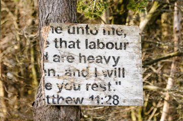 Broken religious sign typical of many erected in rural Protestant areas of Northern Ireland.