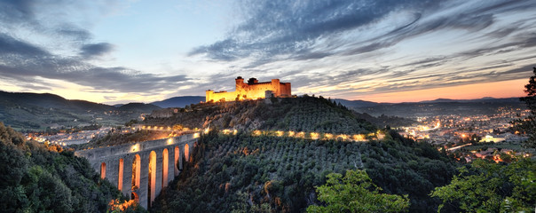 Spoleto, Umbria. The Albornoziana Fortress and the Tower's Bridge at sunset - obrazy, fototapety, plakaty