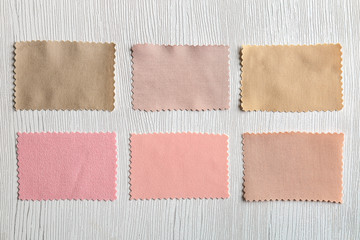 Colorful fabric samples on light background
