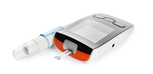 Digital glucometer and lancet pen on white background. Diabetes management