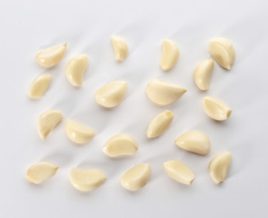 Fototapeta na wymiar Composition with garlic cloves on white background