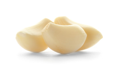 Fresh garlic cloves on white background