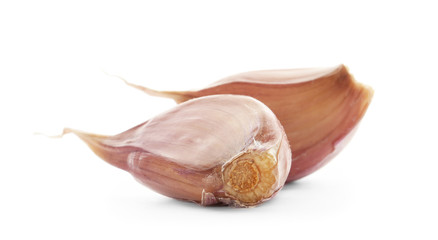 Fresh garlic cloves on white background