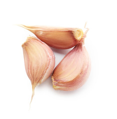 Fresh garlic cloves on white background