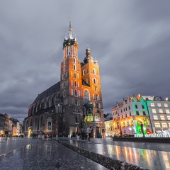 Fototapeta na wymiar St. Mary's Church at night. Market Square - main square in old city. Krakow Poland.