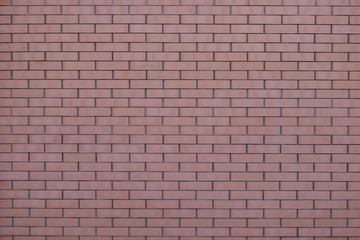 red brick wall background, the texture of the bricks with far