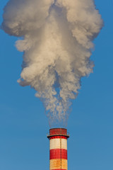 Big white smoke from the factory chimney.