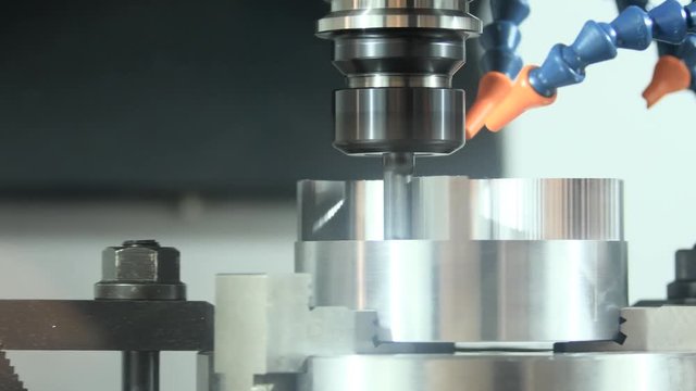 Milling metalwork process. CNC metal machining by vertical mill