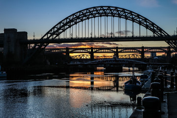 A shot of the many bridges over the river Tyne in Newcastle-upon-Tyne, England, at sunset.