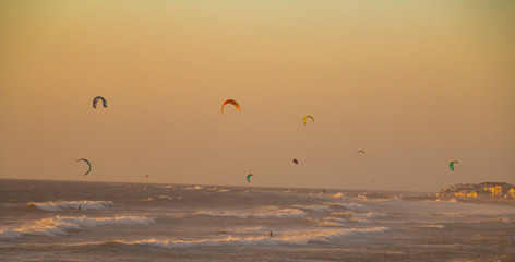 Kite surfing in beautiful sunset