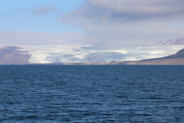 Shade form couds on glacier, Svalbard, Spitsbergen