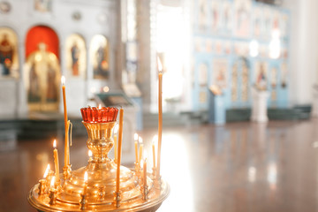 Accessories for the christening of children icons of candles and font, the Ortodox Church. The Sacrament of Children