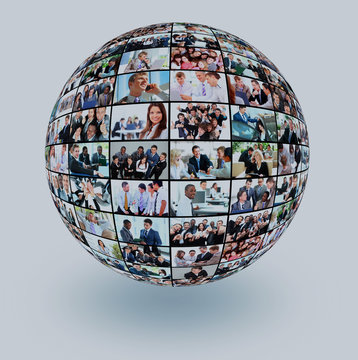 A globe is isolated on a white background with many different business people