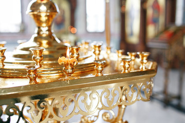 Accessories for the christening of children icons of candles and font, the Ortodox Church. The Sacrament of Children