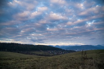 Sunrise and sunset over the buildings in the Zilina city. Slovakia	