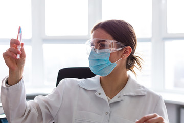 Woman doctor working in the lab