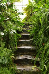 Fototapeta na wymiar Stone steps in the lush garden