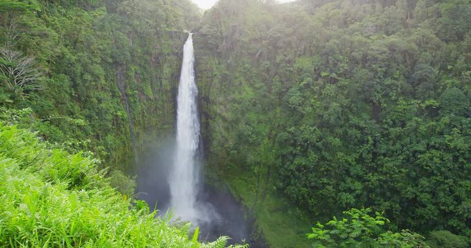 Hawaii Akaka Falls - Hawaiian waterfall on Big Island. Beautiful pristine nature landscape scene showing the famous waterfall, Akaka falls in lush scenery. RED EPIC SLOW MOTION