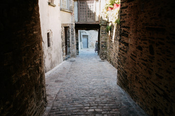 Fototapeta na wymiar narrow stone medieval street in Vitre old town