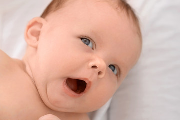 Cute yawning newborn baby, closeup