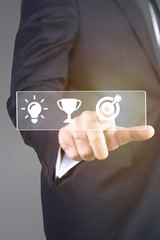 business man hand pressing a touch screen button. target symbols of business man, Business concept 