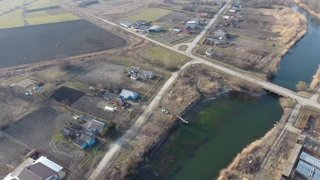 View from the top of the village. Streets without asphalt and single-storey houses. The Kuban village