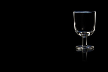 An empty glass of port or sherry.