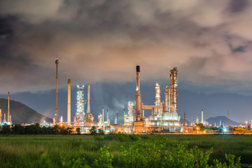 Landscape of oil and gas refinery plant before storm