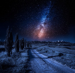 Country road leading to Pienza at night, Tuscany, Italy © shaiith