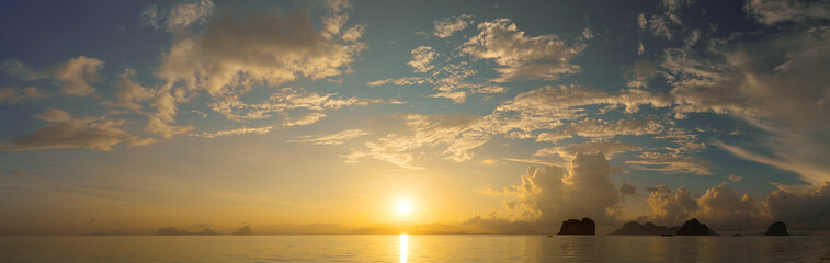 Beautiful panoramic landscape with sun rising over tropical ocean, Thailand