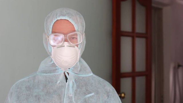 Hazard sign. Man in protective suit. Personal protective equipment
