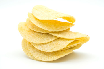 Fototapeta na wymiar Fried yellow potato chips isolated on white background .